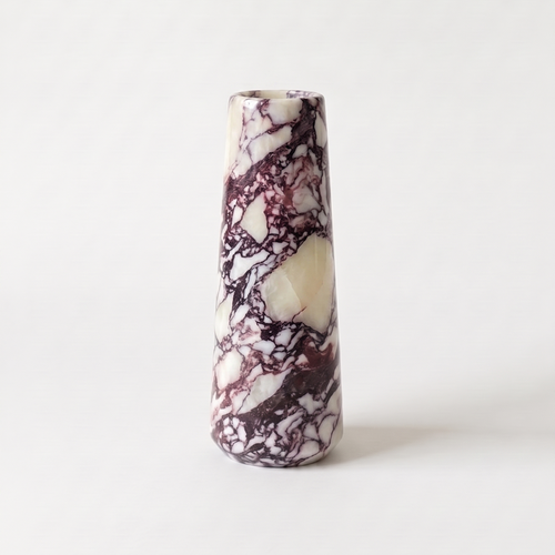 Calacatta Viola Marble vase on a white background