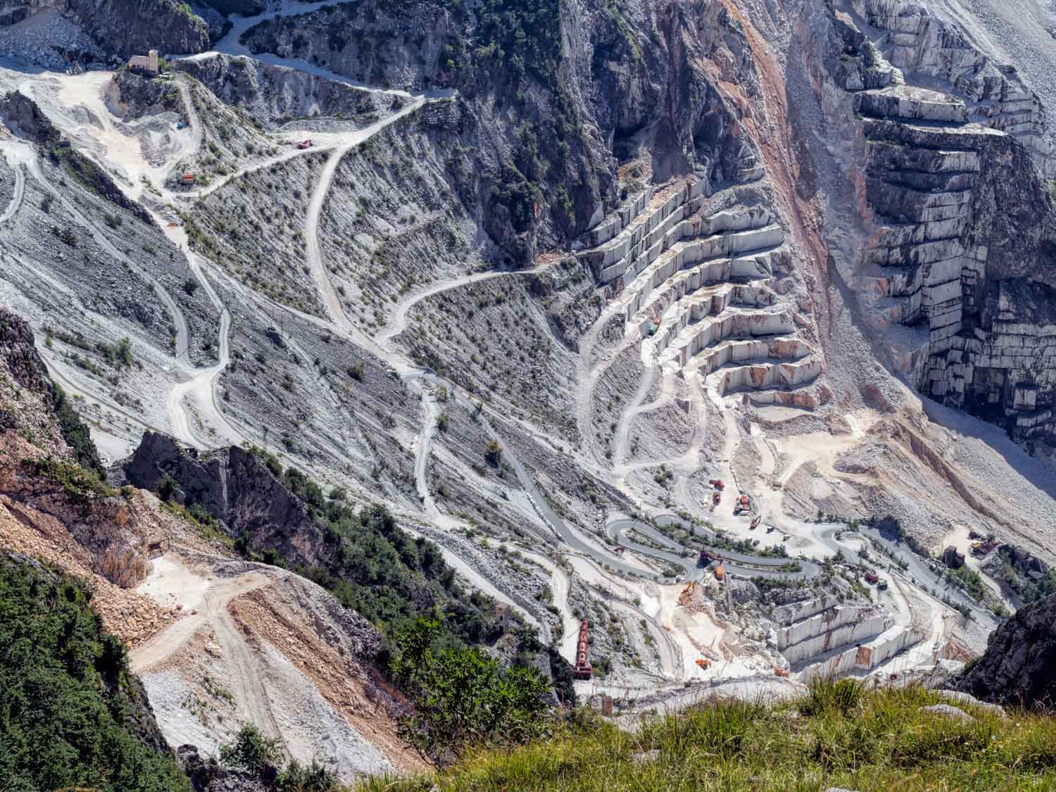 Large marble quarry with steep cliffs and open excavation