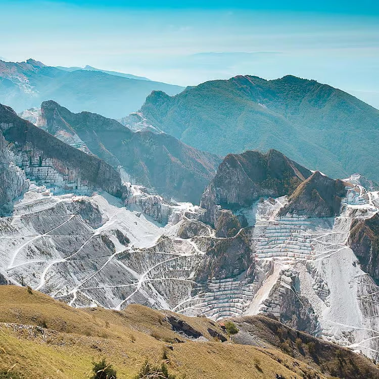 Mountainous landscape with a  marble quarry and clear blue sky